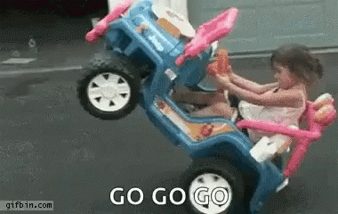Little Girl Riding Blue Toy Car Saying Go Go Go GIF
