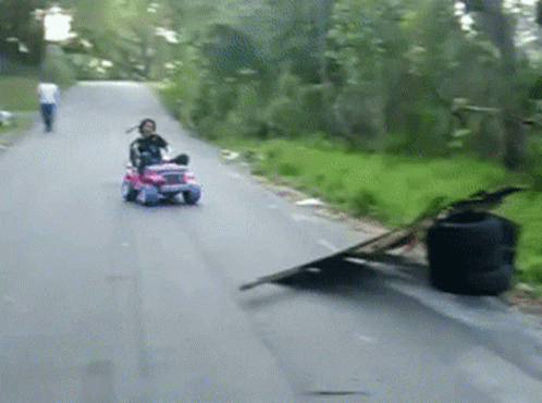 Little Girl Riding Pink Toy Jeep GIF