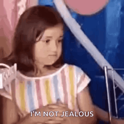 Little Girl Says I'm Not Jealous With Hands Folded GIF