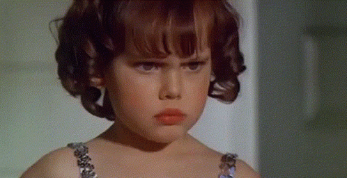 Little Girl Serious Wearing Bra