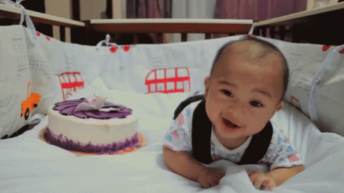 Little Girl Sitting at Table Thankful For Another Year
