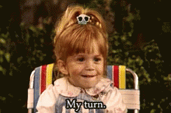 Little Girl Sitting In Beach Chair Saying My Turn GIF