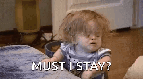 Little Girl Sitting on Couch Crying Says Must I Stay