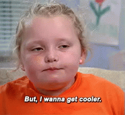 Little Girl Sitting on Couch Saying I Wanna Get Cooler