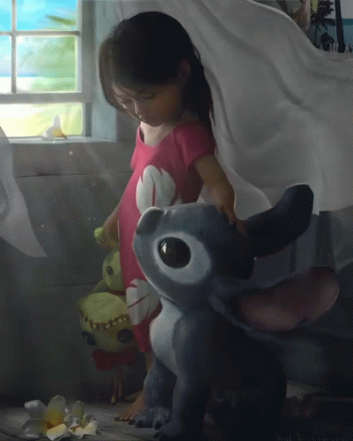 Little Girl Standing Next to Stuffed Animal