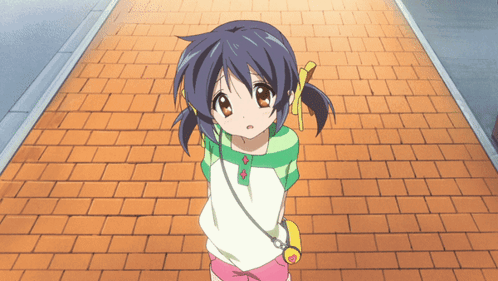 Little Girl Standing On Brick Sidewalk GIF