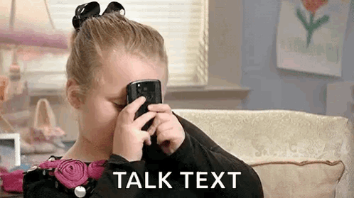 Little Girl Talking on Cell Phone Covering Face