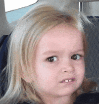 Little Girl with Blonde Hair Making Serious Face