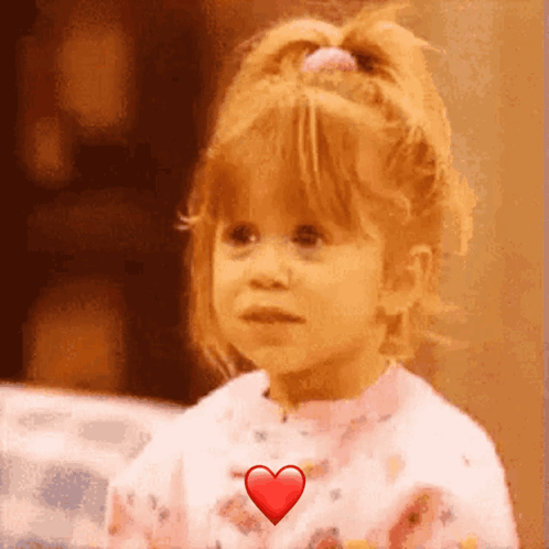 Little Girl With Heart In Chest GIF