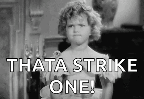 Little Girl with Strike One Words