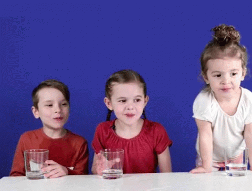 Little Girls Spit Water On Table GIF