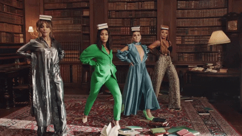 Little Mix Members Balance Books On Their Heads GIF