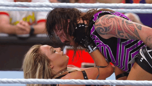 Liv Morgan And Dominik Mysterio Kiss GIF