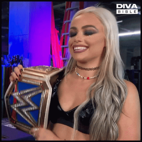 Liv Morgan Hugging Championship Belt GIF