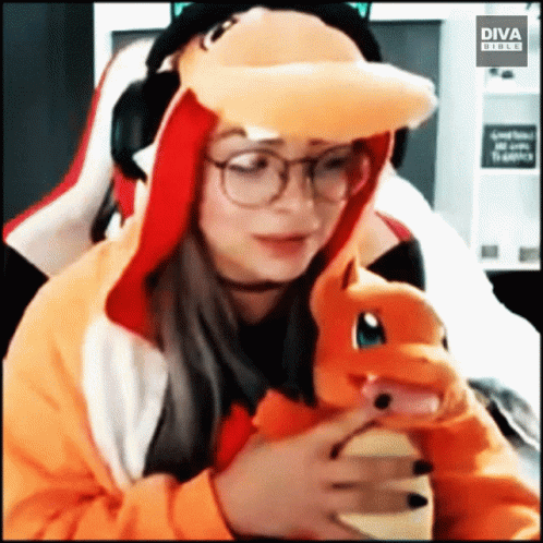 Liv Morgan With Charmander Stuffed Toy GIF