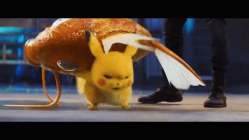 Live Action Pokemon Pikachu Tossing Magikarp GIF