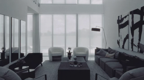 Living Room With Couch, Chairs, and Painting