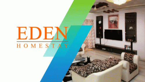 Living Room With Eden Homestay Logo