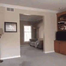 Living Room With Wall Picture And Floor Lamp GIF