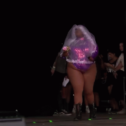 Lizzo In Her Pink Glitters Outfit GIF