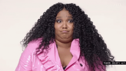 Lizzo Looking Around Reaction GIF