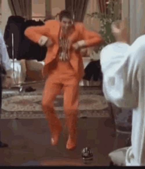Lloyd Christmas Jim Carrey Funny Dance GIF 