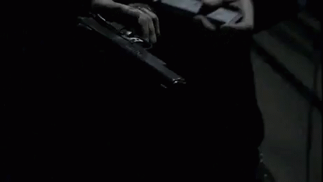 Loading Gun In The Dark GIF