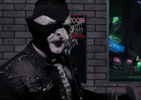 Lock And Load Man Wearing A Costume GIF