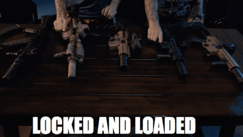 Lock And Load Two Men With Guns GIF