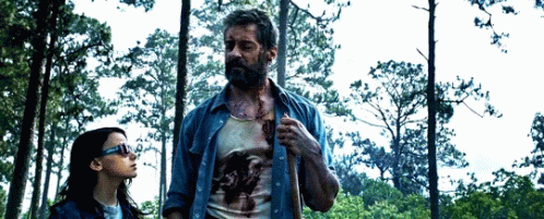 Logan And The Little Girl In The Forest GIF
