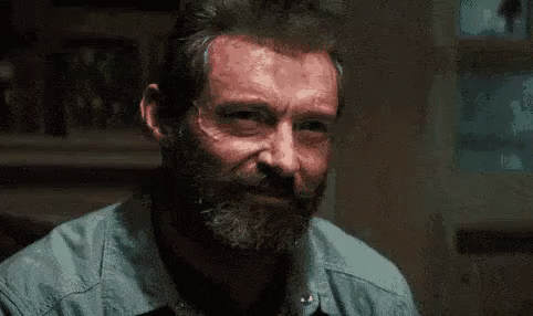 Logan Smiling With The Gal GIF