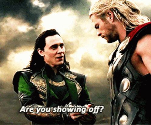Loki And Thor Are Standing Next To Each Other And Thor Is Asking Loki If He 'S Showing Off GIF