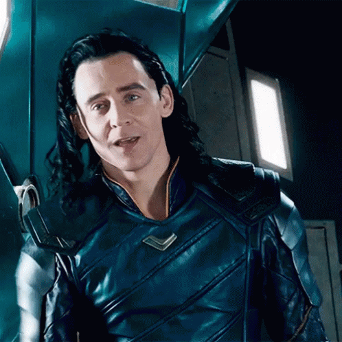 Loki From Avengers : Age Of Ultron Is Wearing A Blue Leather Jacket And Smiling . GIF