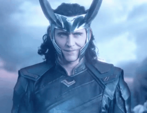Loki From Avengers : Age Of Ultron Is Wearing A Helmet With Horns And Smiling . GIF