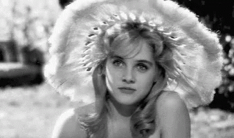 Lolita Wearing A Hat GIF
