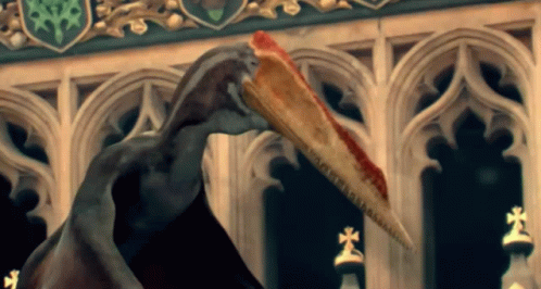 Long Beak Bird Statue Holding Pizza GIF