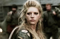Long Blonde Hair Woman Standing Before Crowd GIF