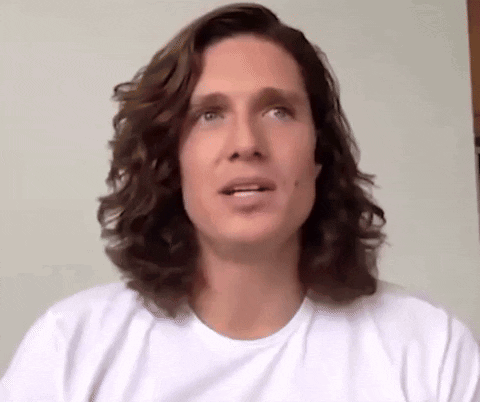 Long Curly Hair Man Making Funny Face
