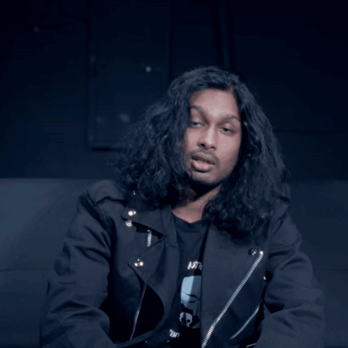 Long Hair Man In Black Jacket Shirt Saying Nothing GIF