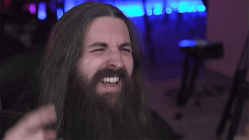 Long Haired Bearded Man Giving Horns GIF