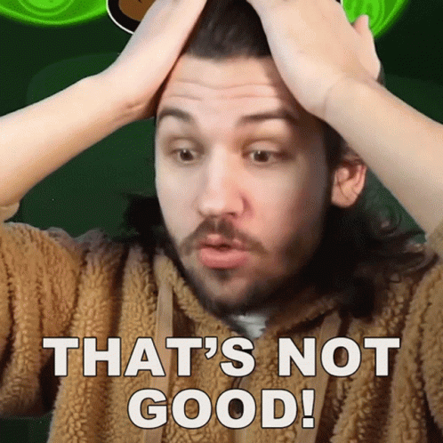 Long Haired Bearded Man Holding Head Saying That's Not Good