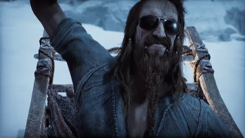 Long Haired Bearded Man in Sunglasses on Sled