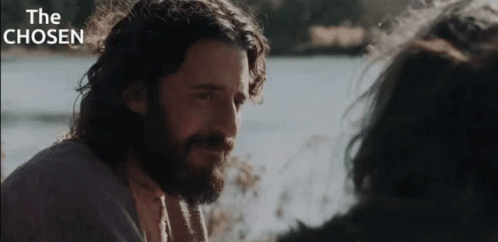 Long Haired Bearded Man Looking at Woman With The Chosen Above