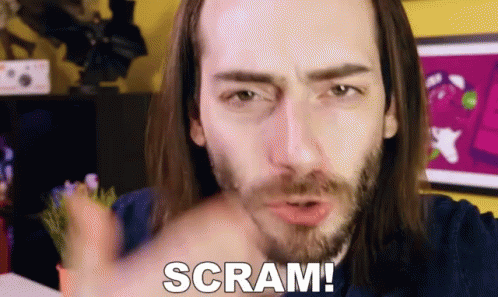 Long Haired Bearded Man Pointing Saying Scram