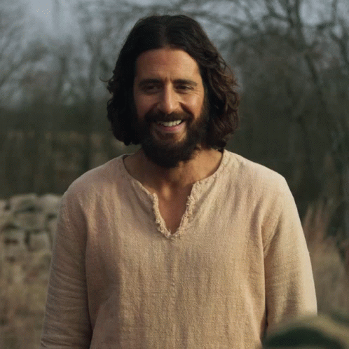 Long Haired Bearded Man Smiling in Field