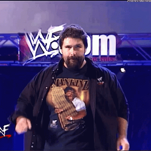 Long Haired Bearded Man Talking Into TCW Microphone