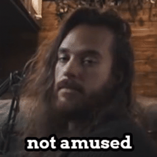 Long Haired Guy Not Amused GIF