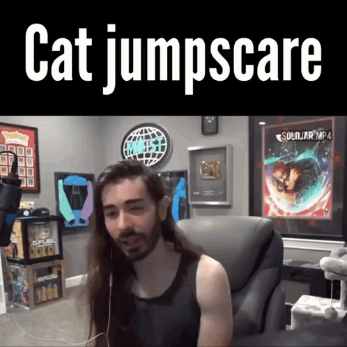 Long Haired Man Sitting in Chair Cat Jumpscare