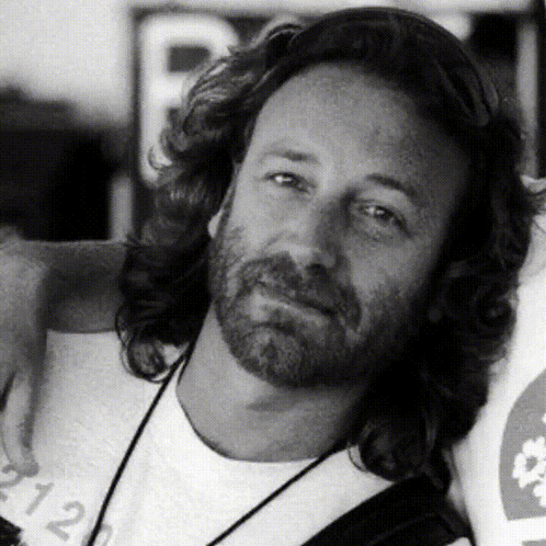 Long Haired Man With Beard in White Shirt 212