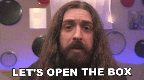 Long Haired Man With Beard Saying Let's Open Box GIF